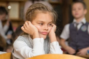 Girl bored in class