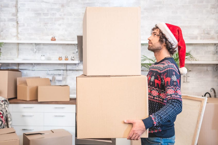 man moving during the holidays